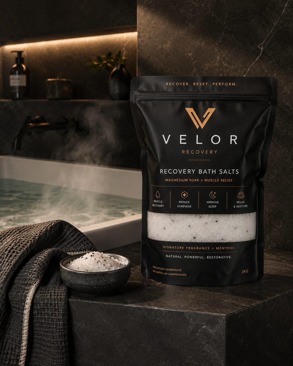 Velor Recovery Soak 2KG pouch beside a bath